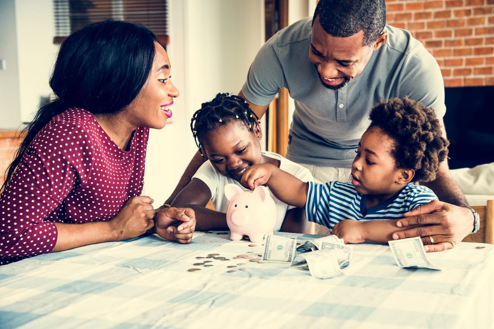 happy-family-with-money-at-home